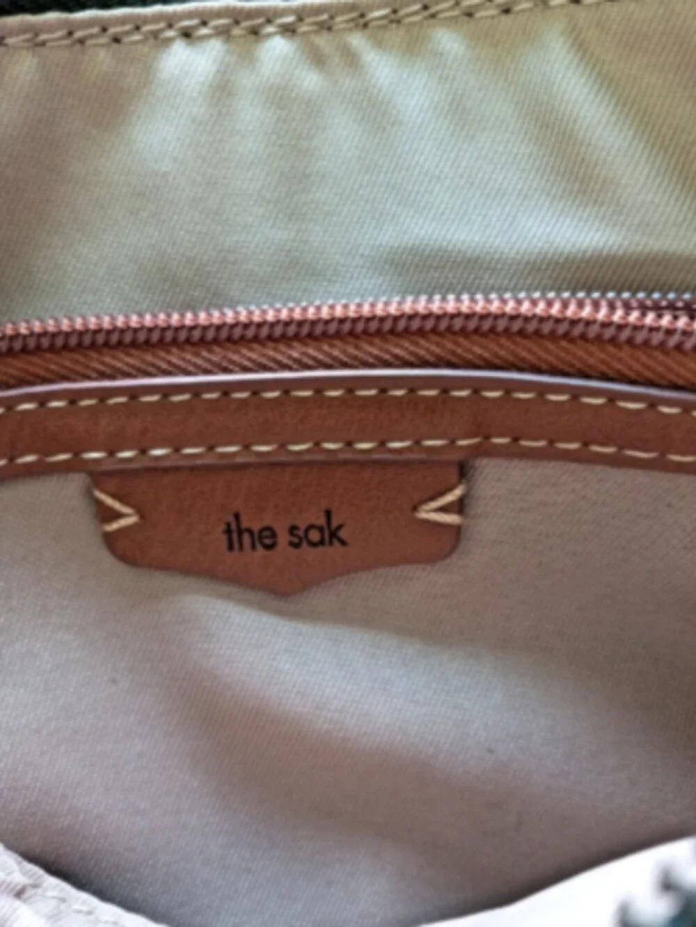 The Sak Brown Leather Crossbody Bag Woven Strap Zip Top Charm Pockets